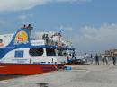 Ferry: Wasteing no time in berthing.